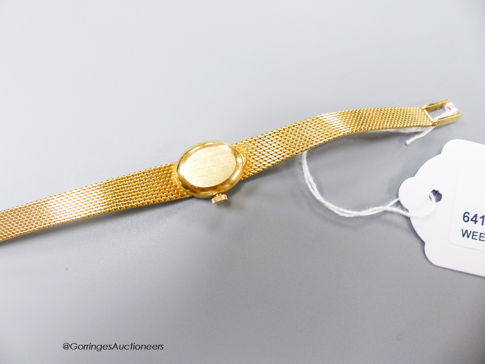 A ladys' 18ct gold Omega manual wind wristwatch